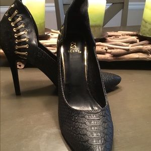 Black and gold high heels